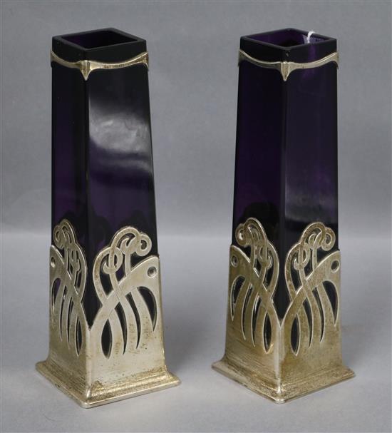 A pair of Austro Hungarian Art Nouveau 800 standard white metal mounted amethyst glass vases.